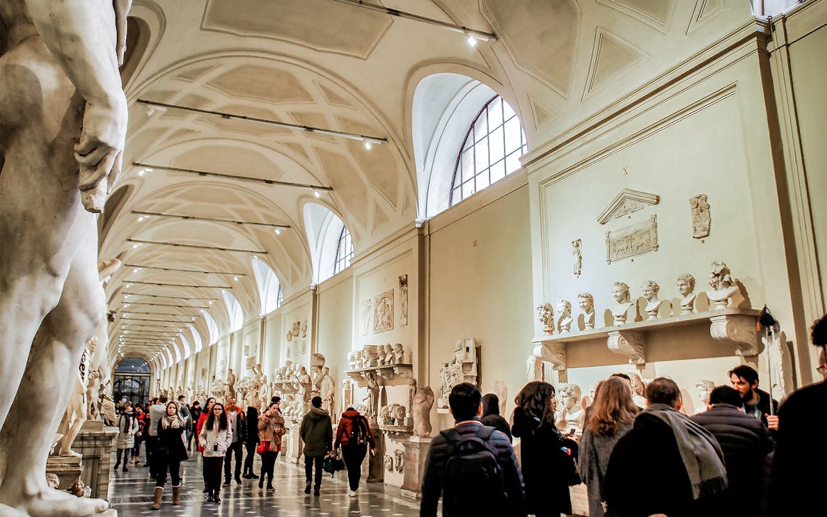 Visitors exploring sculptures at Petit Palais Vincenzo Gemito exhibition in Paris.
