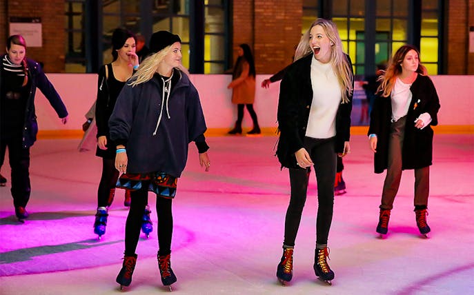 Ice skaters enjoying Alexandra Palace Ice Rink in London.