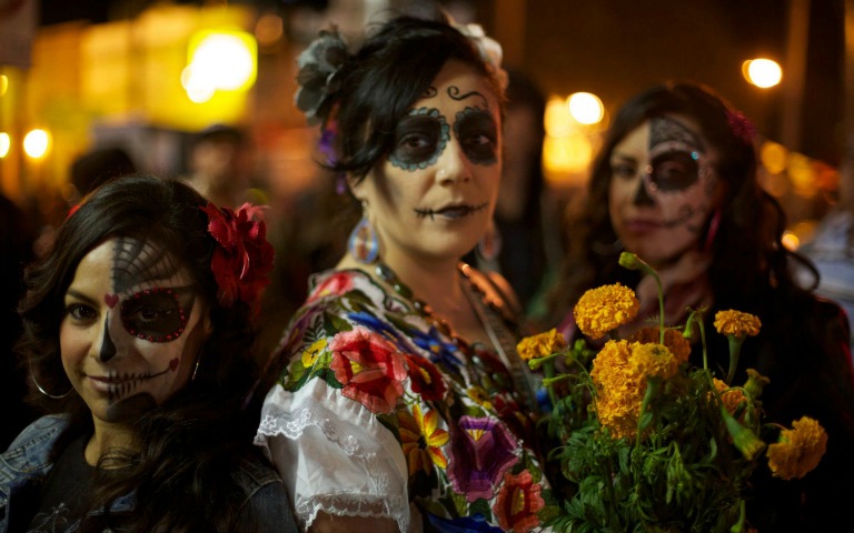 Halloween Massive event with costumed crowd in festive atmosphere.