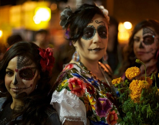 Halloween Massive event with costumed crowd in festive atmosphere.