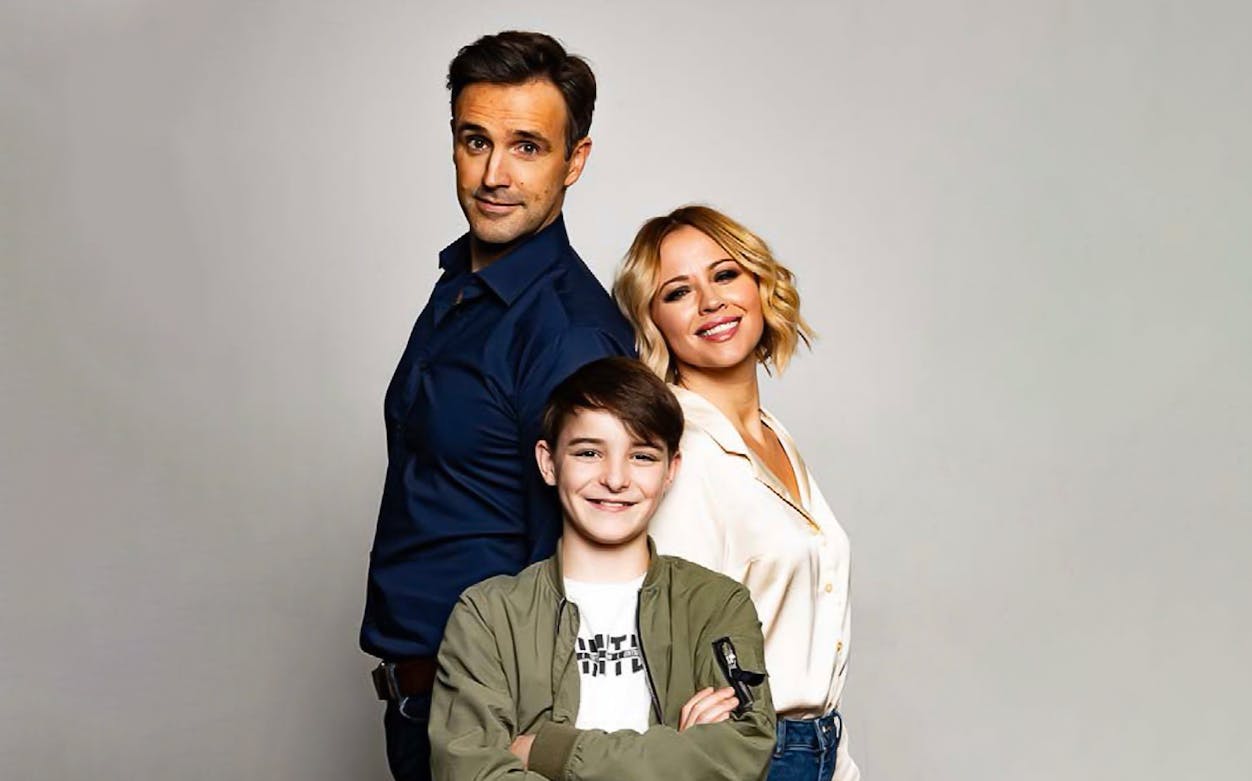 Family cast of Sleepless: A Musical Romance smiling together.