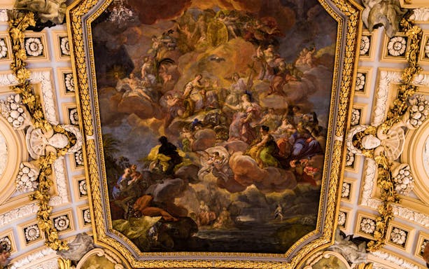 Royal Palace ceiling fresco with mythological figures and ornate gold detailing.