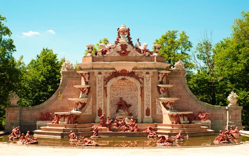 Fountain with intricate sculptures at Royal Palace of San Ildefonso, Spain.
