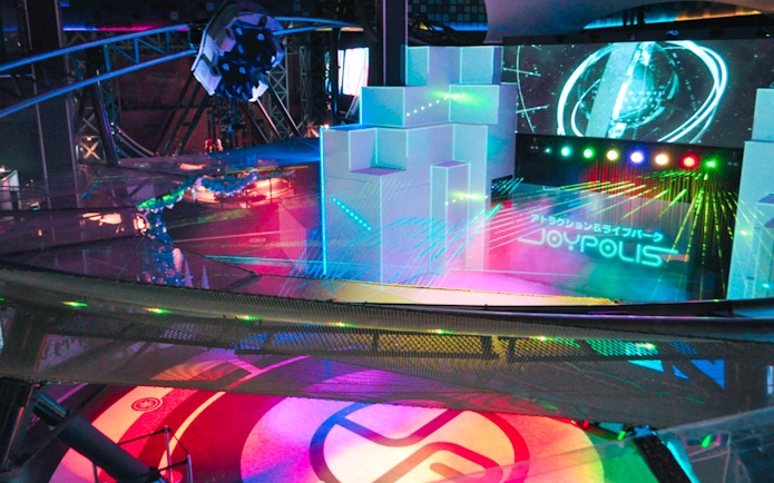 Thrilling rides and vibrant lights at Tokyo JOYPOLIS indoor theme park in Odaiba, Tokyo.