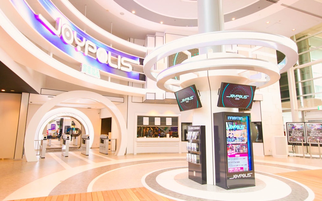 Tokyo JOYPOLIS entrance with digital displays in Odaiba, Tokyo.