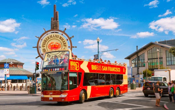 Open-top tour bus at Fisherman's Wharf, San Francisco.