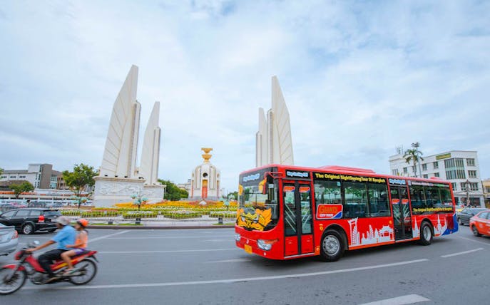 Hop-on-hop-off tour bus at Democracy Monument, Bangkok.