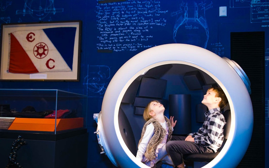 Children exploring a submarine exhibit at the Australian National Maritime Museum in Sydney.