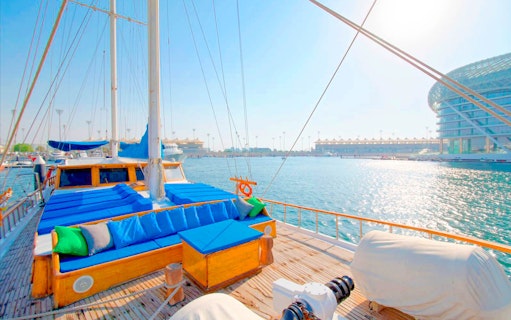 Sailing yacht deck on Yas Marina Boat Tour, Abu Dhabi, with waterfront view.