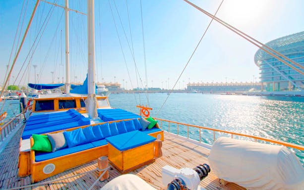 Sailing yacht deck on Yas Marina Boat Tour, Abu Dhabi, with waterfront view.
