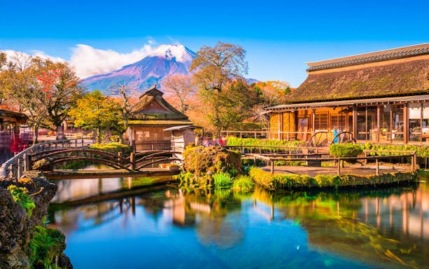 Traditional Japanese village with Mt. Fuji in the background, part of the World Heritage Mt. Fuji Golden Tour.