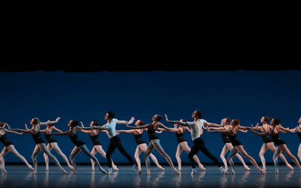 Ballet dancers performing a George Balanchine choreography on stage.