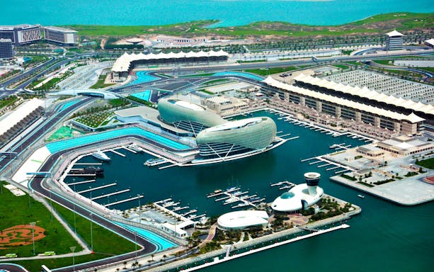 Aerial view of Yas Marina Circuit and Yas Viceroy Hotel in Abu Dhabi, part of the seaplane tour.
