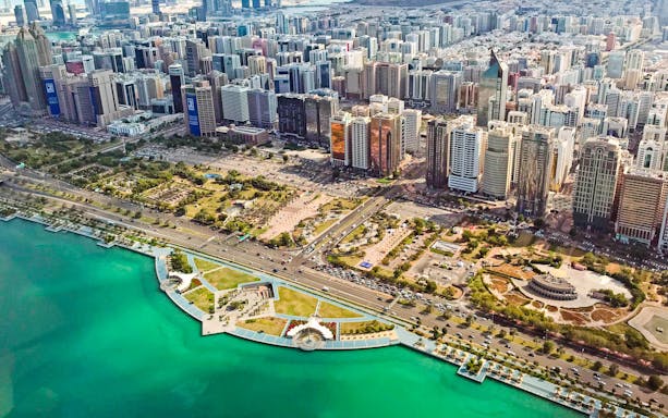 Aerial view of Abu Dhabi skyline and waterfront, part of seaplane tour to Ferrari World.