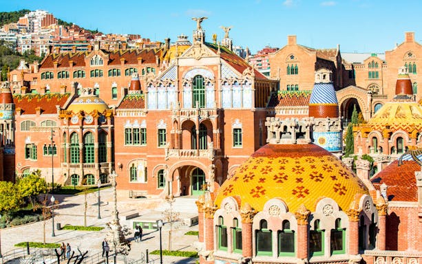 Sant Pau Art Nouveau site with colorful domes and intricate architecture in Barcelona.