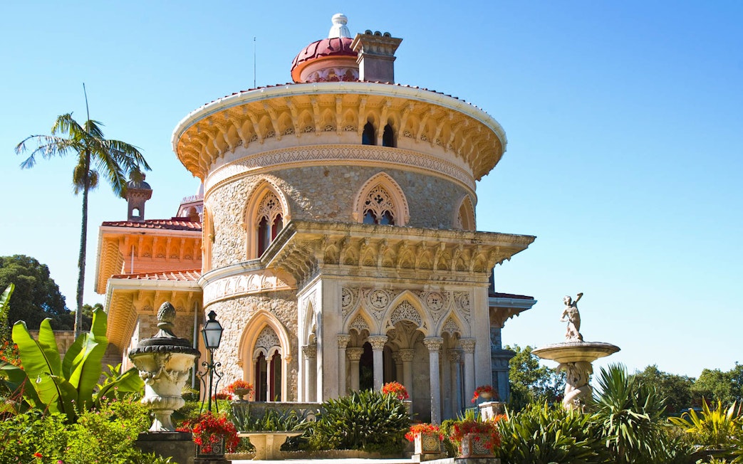 Monserrate Palace in Sintra with ornate architecture and lush gardens.