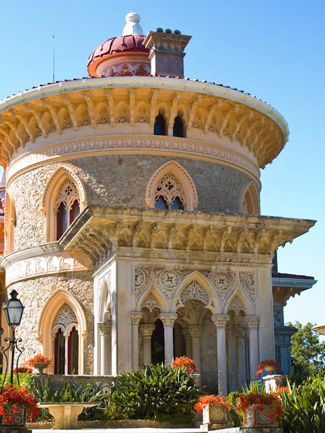 Monserrate Palace in Sintra with ornate architecture and lush gardens.