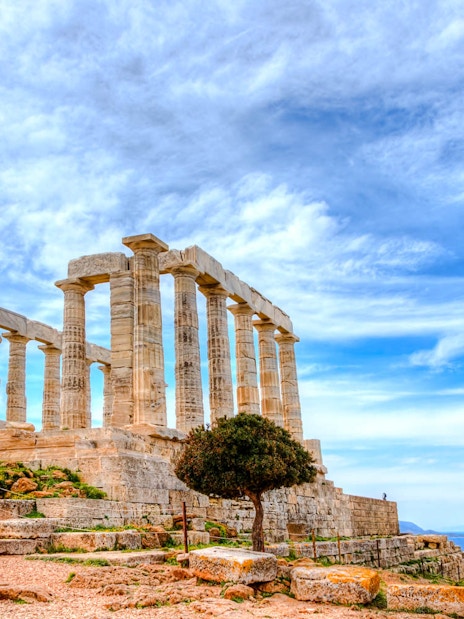 Temple of Poseidon at Cape Sounion with sea view, part of guided tour from Athens.