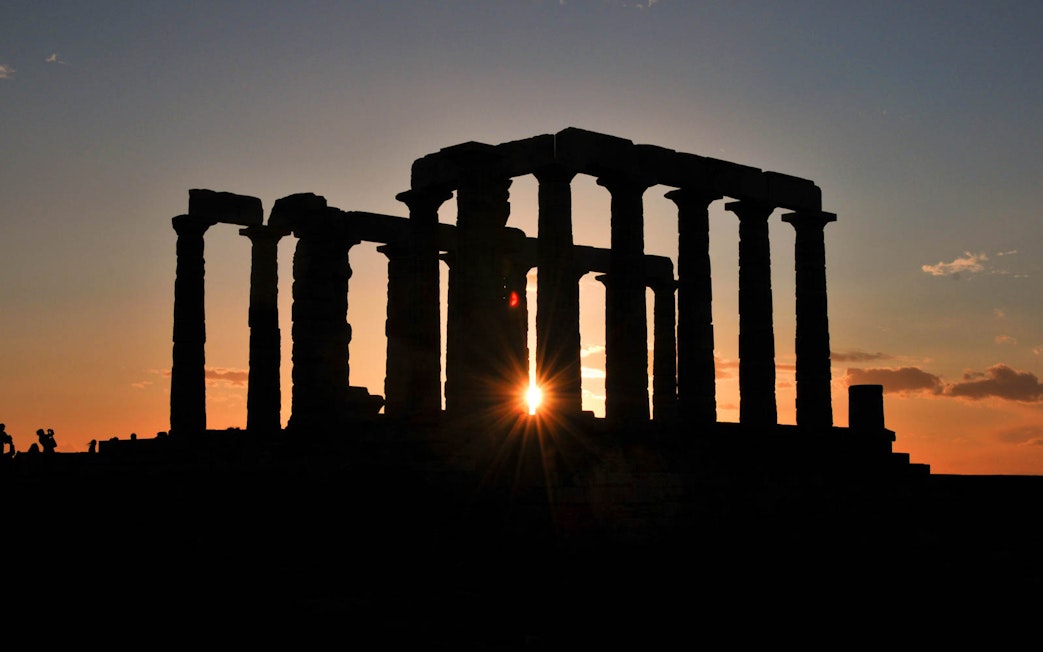 Temple of Poseidon at sunset, Cape Sounion, viewed from Athens tour.