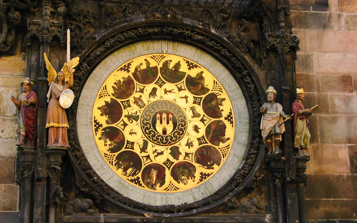 Prague Astronomical Clock detail with zodiac signs and statues.