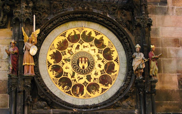 Prague Astronomical Clock detail with zodiac signs and statues.