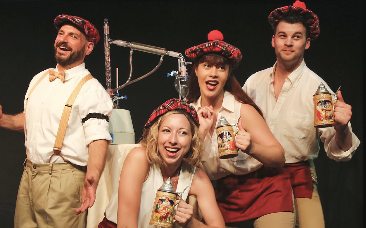 Performers in plaid hats holding beer steins during The Imbible: A Spirited History of Drinking show.