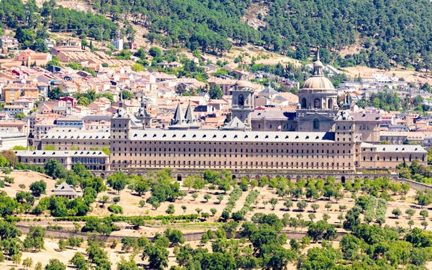 Royal Monastery of El Escorial with surrounding landscape in San Lorenzo de El Escorial, Spain.