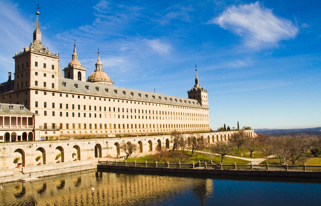 Royal Monastery of El Escorial with reflection in water, Spain.