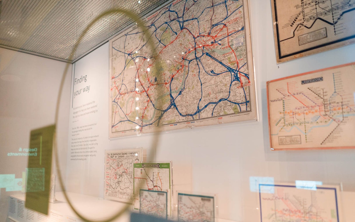 Historic London transport maps displayed at the London Transport Museum.