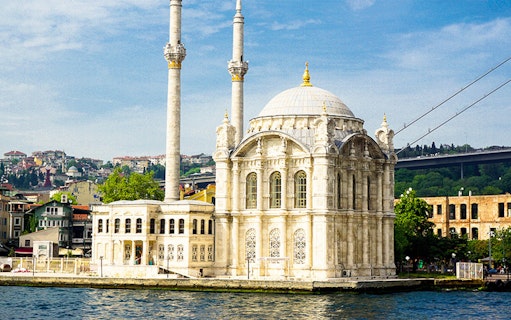 Ortaköy Mosque by the Bosphorus on a sunny day during a 2-hour boat tour in Istanbul.