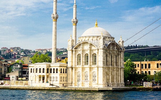 Ortaköy Mosque by the Bosphorus on a sunny day during a 2-hour boat tour in Istanbul.