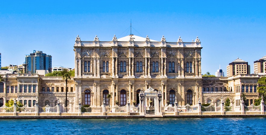 Dolmabahce Palace facade along the Bosphorus in Istanbul, Turkey.