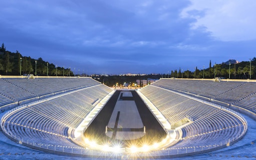 Panathenaic Stadium in Athens at dusk, part of the Skip the Line Acropolis Museum & Athens City Tour.