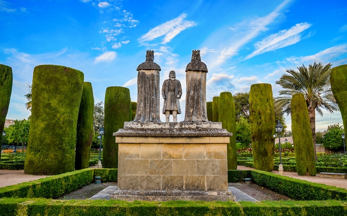 Statue of historical figures in Alcazar gardens, Cordoba.