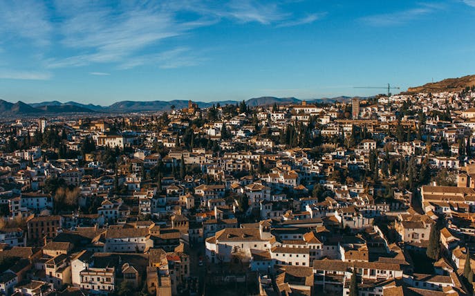 Aerial view of Albaicin neighborhood with Moorish houses in Granada, Spain.