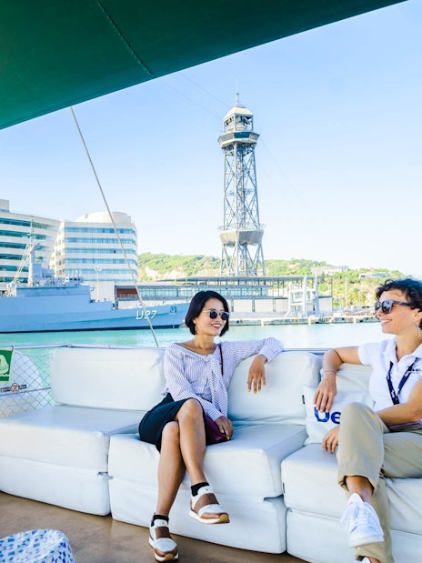 Sailing trip in Barcelona with views of the World Trade Center and Port Vell.