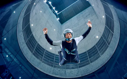 Indoor skydiver in flight at Clymb Abu Dhabi wind tunnel.