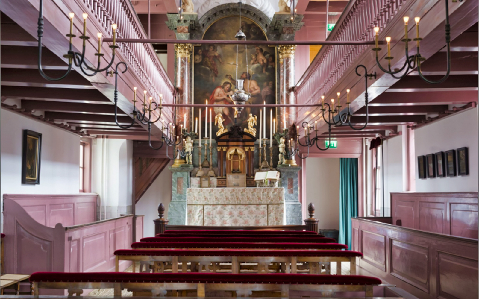 Our Lord in the Attic Museum chapel interior with altar and pews, Amsterdam.