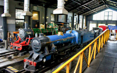 Historic steam locomotives displayed at Kyoto Railway Museum.