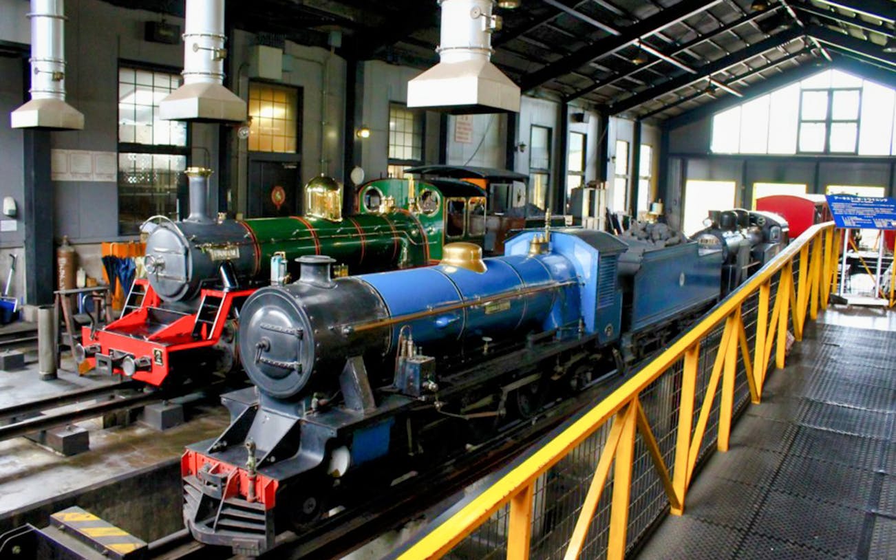 Historic steam locomotives displayed at Kyoto Railway Museum.