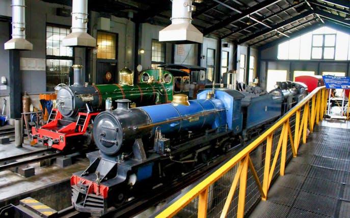 Historic steam locomotives displayed at Kyoto Railway Museum.