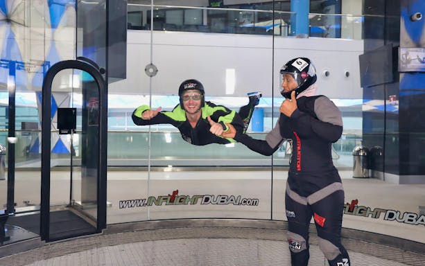 Indoor skydiving experience at In Flight Dubai with instructor guidance.