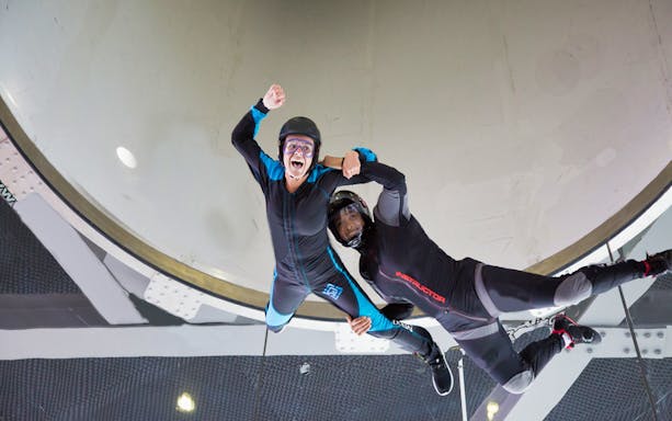 Indoor skydiving experience at In Flight Dubai with instructor guidance.
