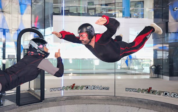 Indoor skydiving experience at In Flight Dubai with instructor guidance.