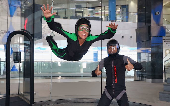 Indoor skydiving experience at In Flight Dubai with instructor guidance.