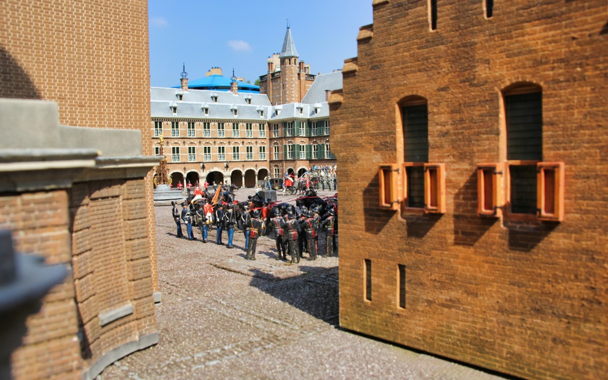 Miniature soldiers in a courtyard at Madurodam Miniature Park, Netherlands.