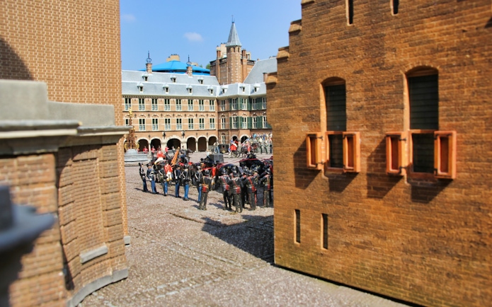 Miniature soldiers in a courtyard at Madurodam Miniature Park, Netherlands.