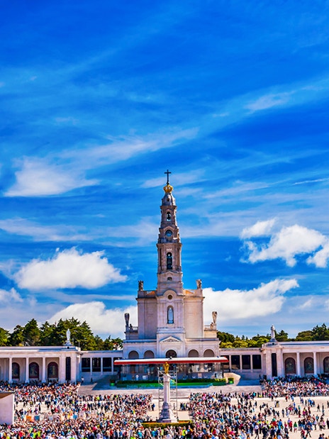 Fátima Sanctuary with crowds, part of a half-day guided tour from Lisbon.