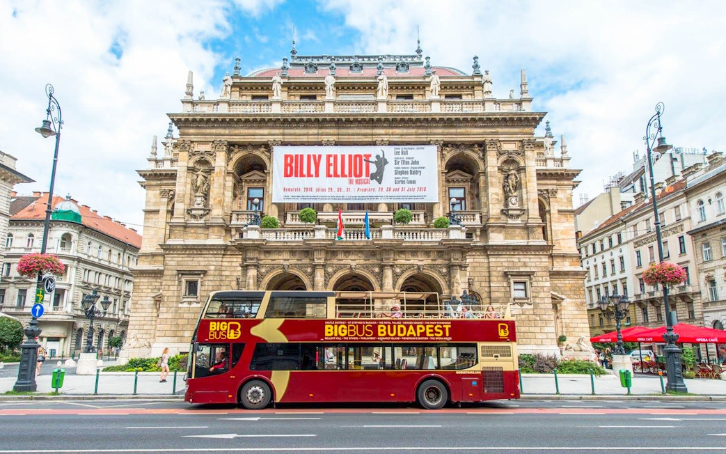 Hop-On Hop-Off bus in front of the Hungarian State Opera, Budapest.