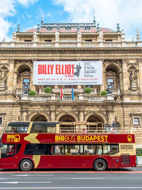 Hop-On Hop-Off bus in front of the Hungarian State Opera, Budapest.